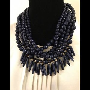 New... the navy blue beads are the perfect touch